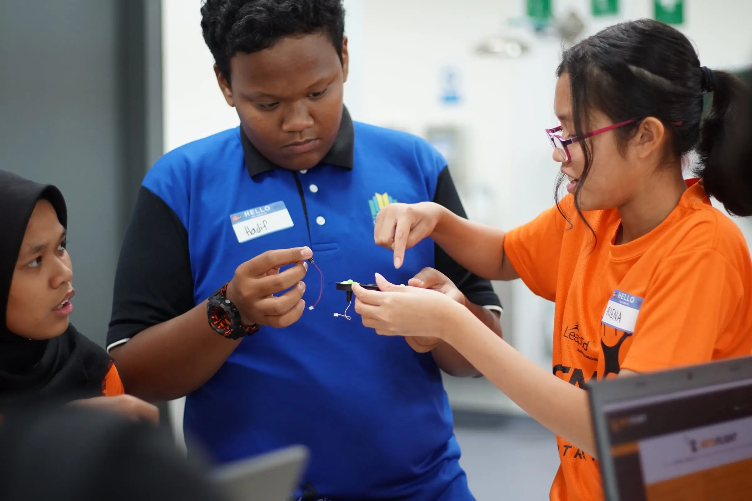 Two secondary students working on an electronics project at the STEM Festival